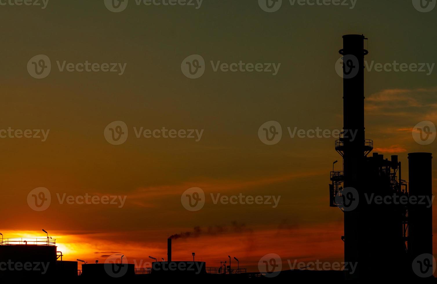 Gas turbine electrical power plant. Energy for support factory in industrial estate. Natural gas tank. Small gas power plant. Power plant using natural gas for fuel. Green energy. Dramatic sunset sky. photo