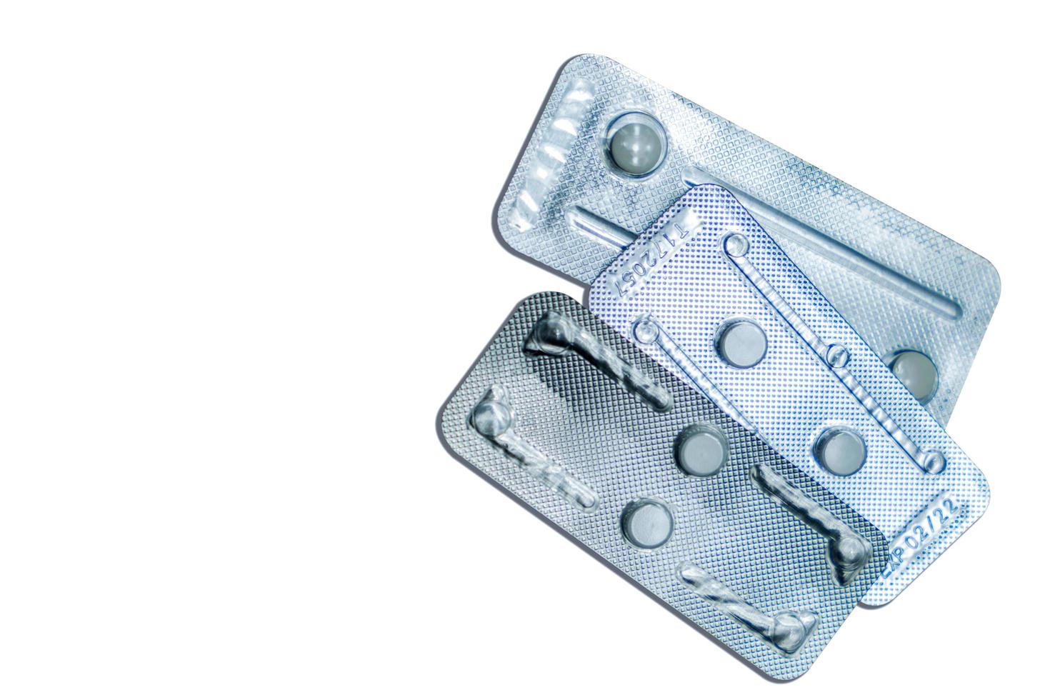 Emergency contraceptive pills in blister pack isolated on white background. Morning after pills. Cause of ectopic pregnancy. Emergency contraception for prevent pregnancy after unprotected sex. photo