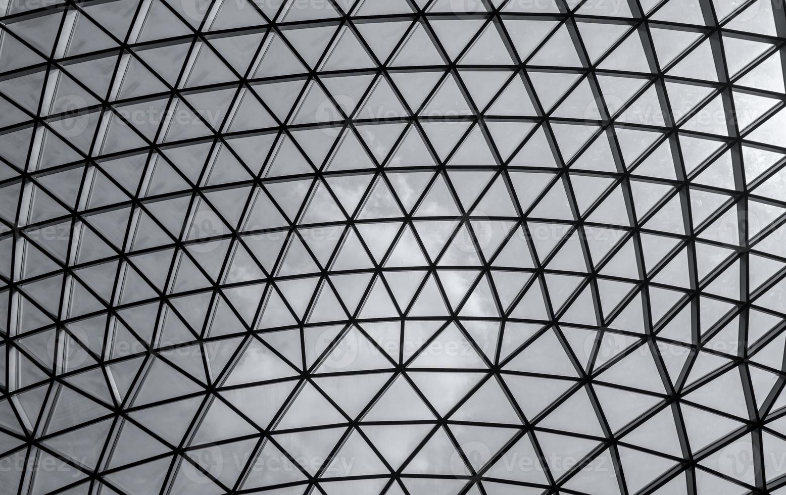 Glass and steel building with triangle pattern structure. Futuristic architecture. Neo-futurism architectural style. White triangle geometric dome texture. Creative art design of modern building. photo