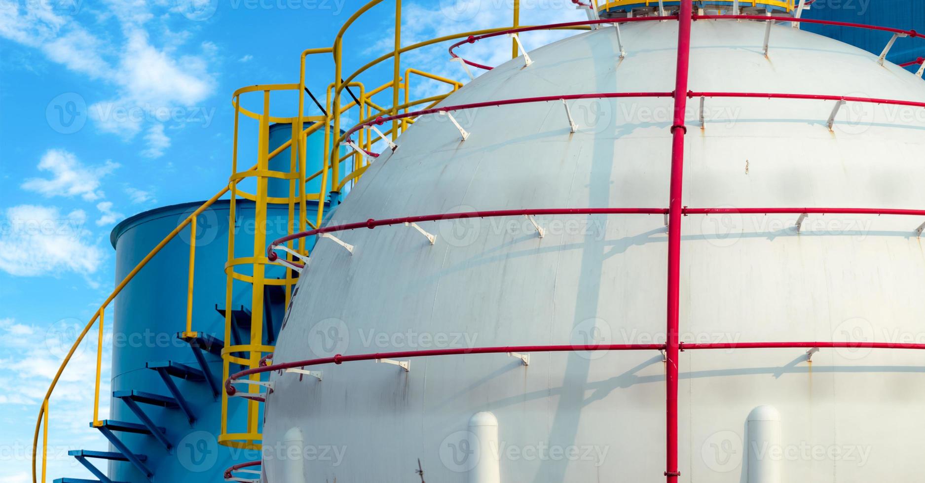 Industrial gas storage tank. LNG or liquefied natural gas storage tank. Spherical Gas reservoirs in petroleum refinery. Above-ground storage tank. Natural gas storage industry. Ball shape lpg tank. photo