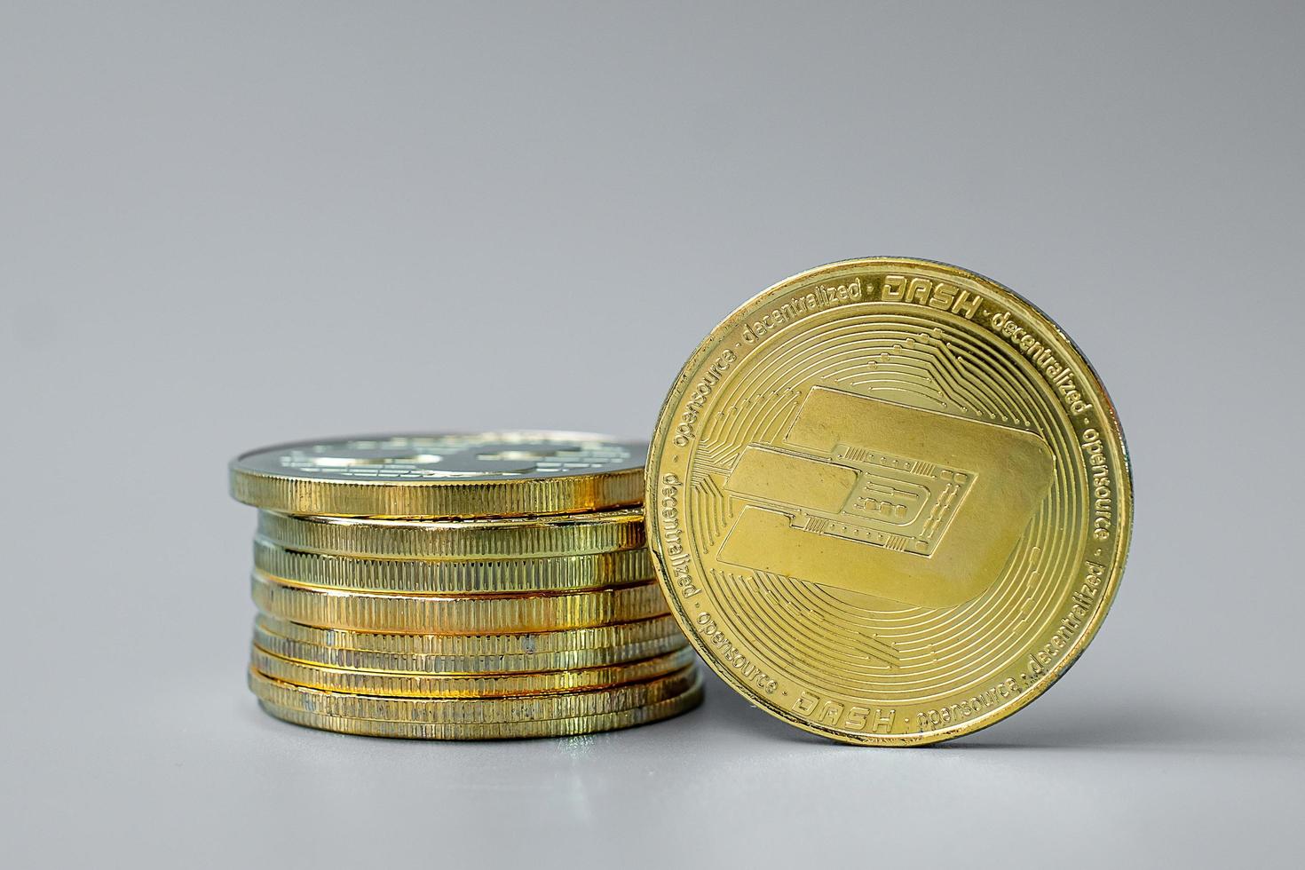 golden Dash cryptocurrency coin stack, Crypto is Digital Money within the blockchain network, is exchanged using technology and online internet exchange. Financial concept photo