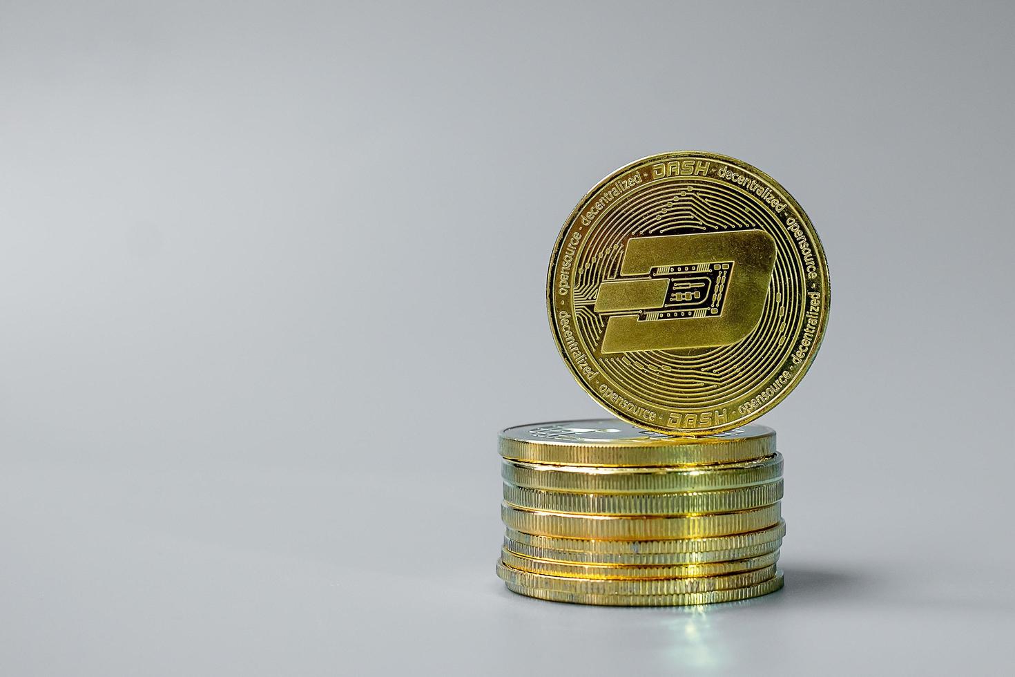 golden Dash cryptocurrency coin stack, Crypto is Digital Money within the blockchain network, is exchanged using technology and online internet exchange. Financial concept photo