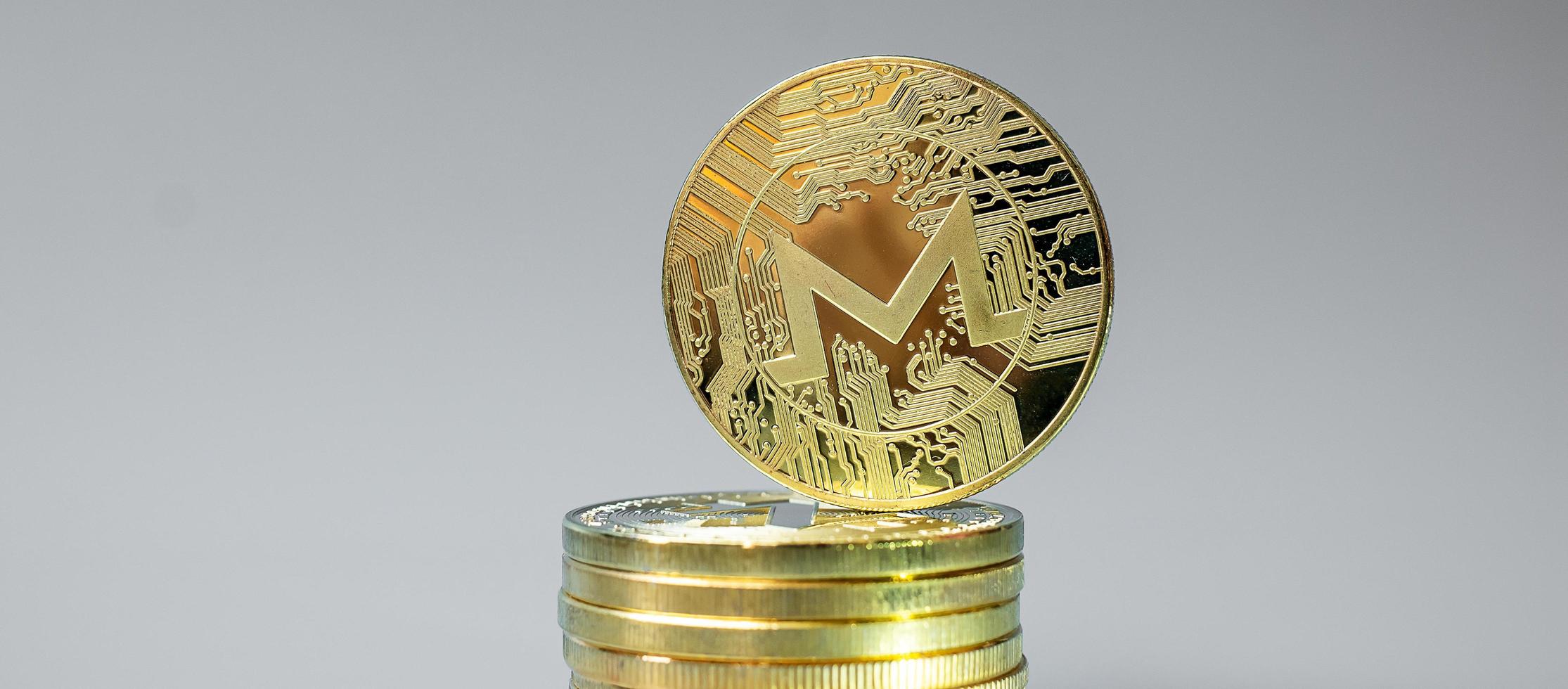 golden Monero  cryptocurrency coin stack, Crypto is Digital Money within the blockchain network, is exchanged using technology and online internet exchange. Financial concept photo