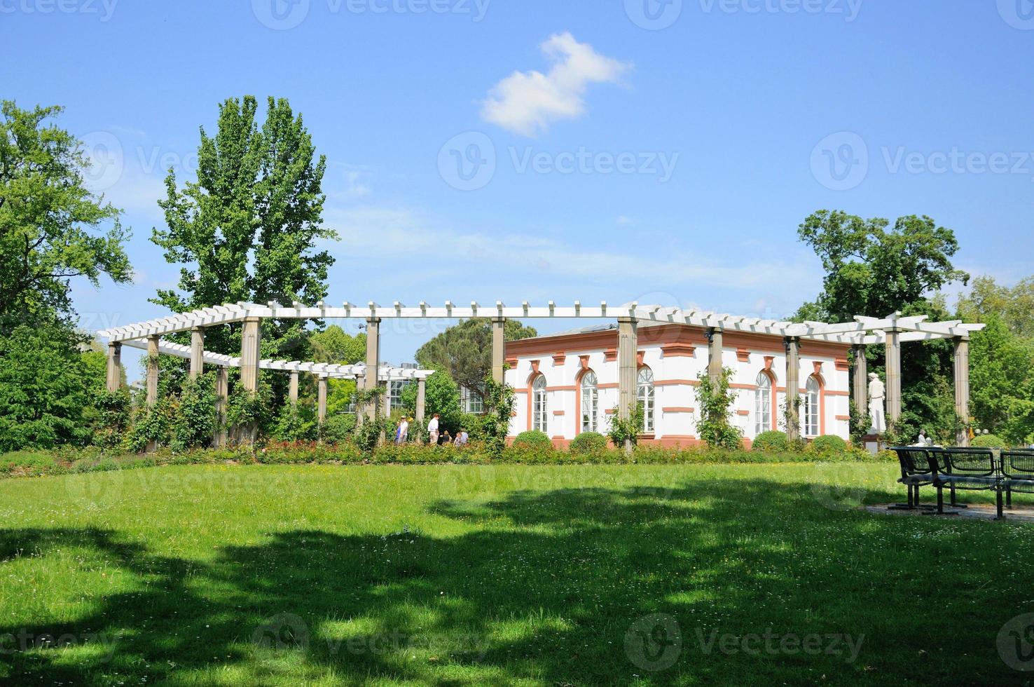 Nature and a white building in Palmen Garten, Frankfurt am Main, Hessen, Germany photo