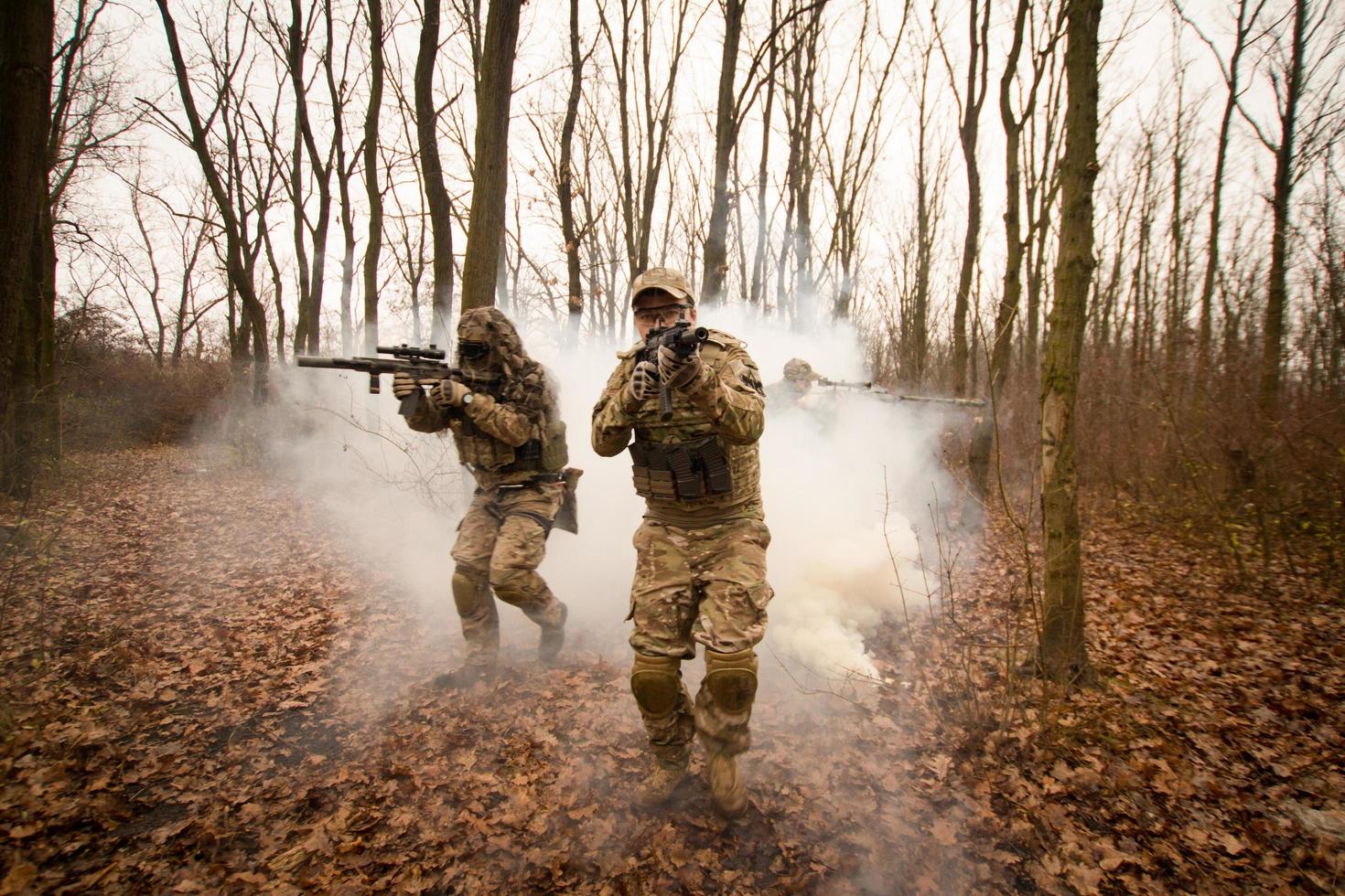 soldiers in the autumn forest photo