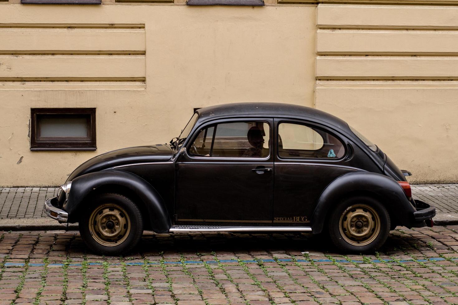 Black retro car on the streets of old Europe photo