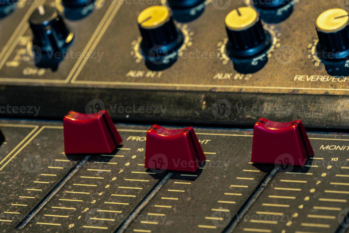 Audio sound mixer console. Sound mixing desk. Music mixer control panel in recording studio. Audio mixing console with faders and adjusting knob. Sound engineer. Sound mixer control radio broadcasting photo