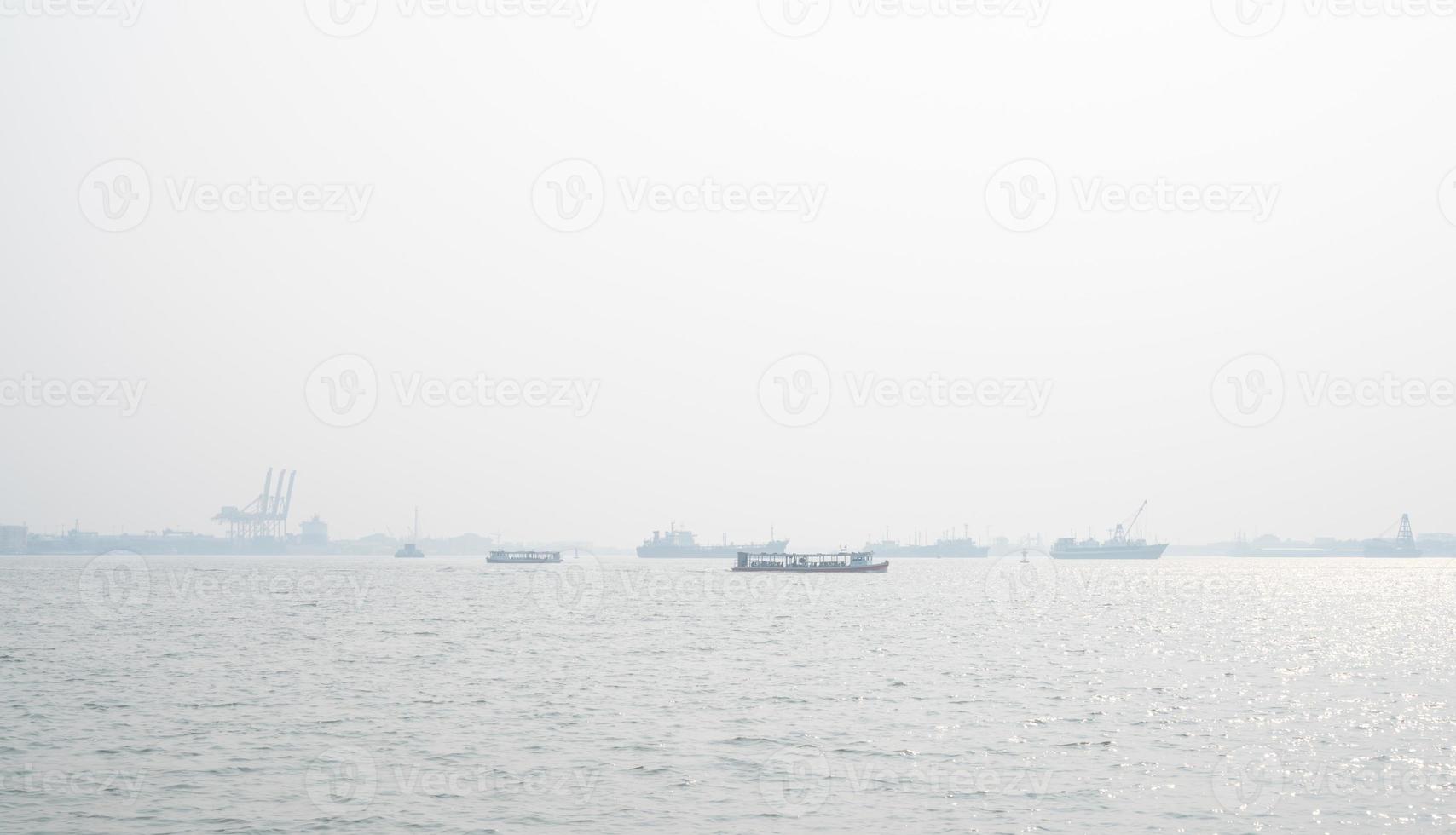 Air pollution at the pier. Bad air quality filled with dust causes of respiratory diseases. Global warming from air pollution problem. Environmental problem from gas carbon monoxide and dust. PM 2.5 photo