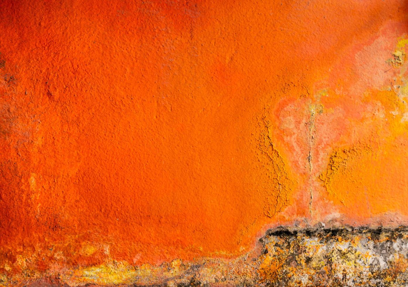 Old and dirty orange color painted on concrete wall texture background with space. Fungus on the house wall photo