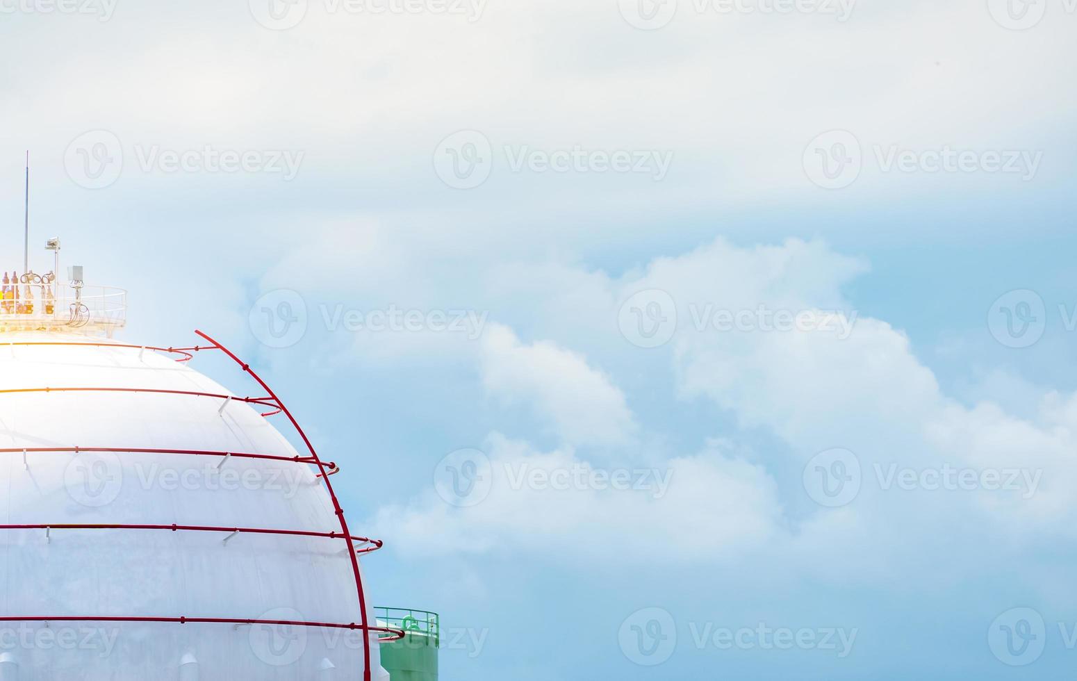 Industrial gas storage tank. LNG or liquefied natural gas storage tank. Spherical gas tank in petroleum refinery. Above-ground storage tank. Natural gas storage industry and global market consumption photo