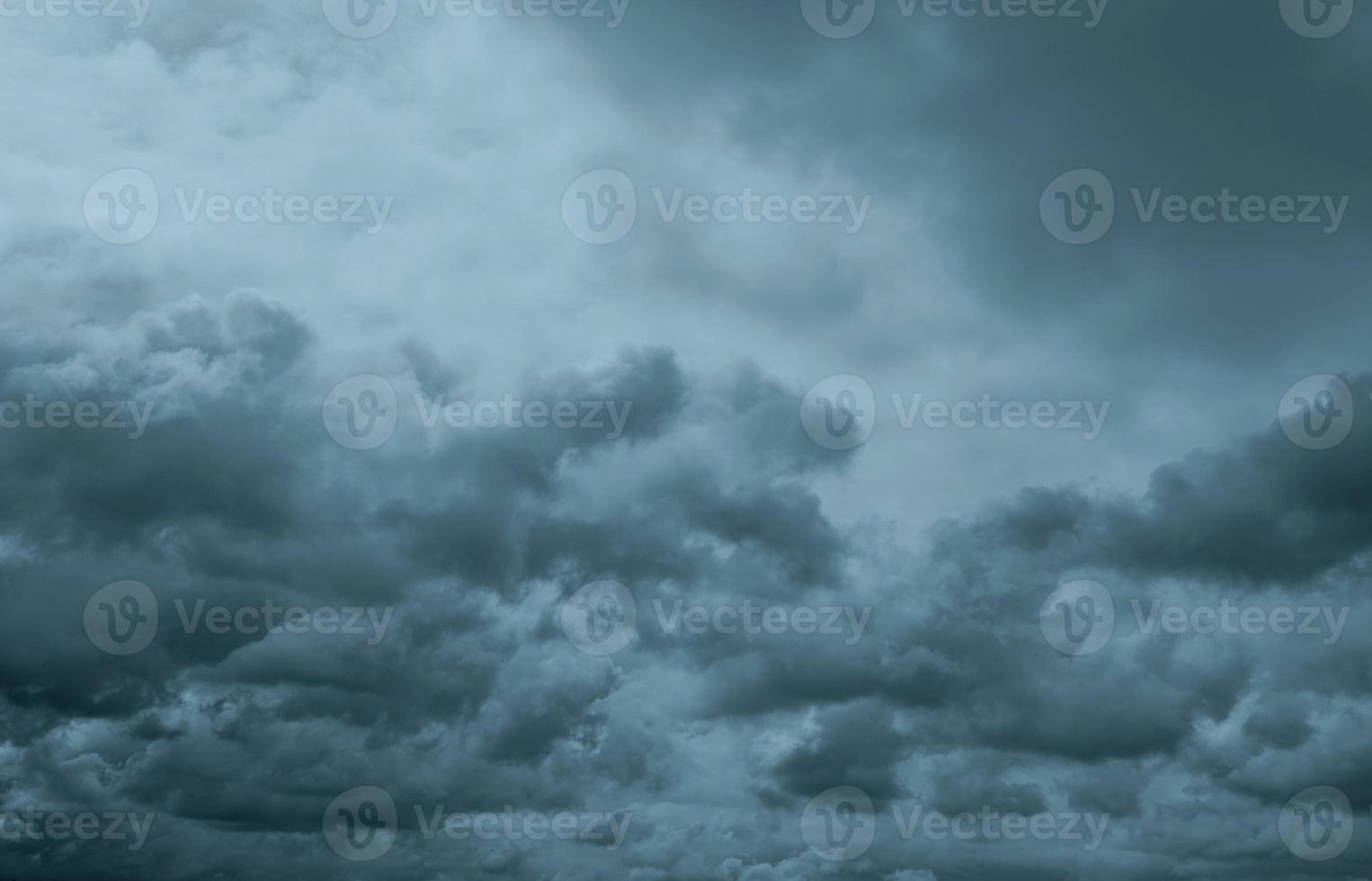 Dark dramatic sky and clouds. Background for death and sad concept. Gray sky and fluffy white clouds. Thunder and storm sky. Sad and moody sky. Nature background. Dead abstract background. Cloudscape. photo