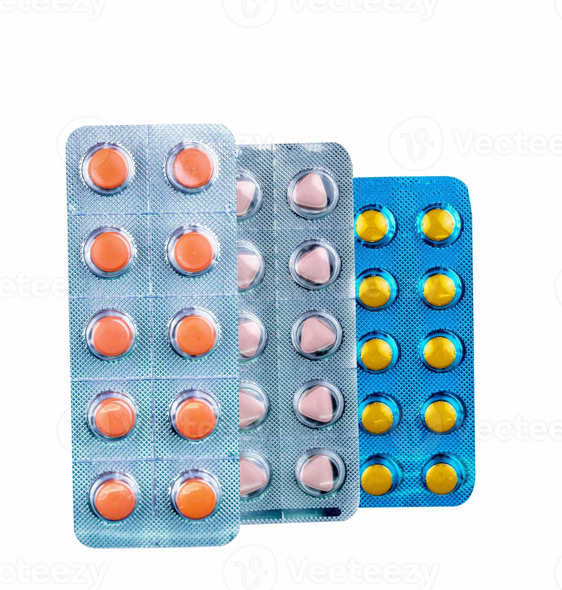 Diclofenac in blister pack isolated on white background. Drug with round  and triangle shaped in pack. Film coated tablets. Orange, yellow, and pale  pink tablets pills. Painkiller medicine. Pharmacy. 7789046 Stock Photo