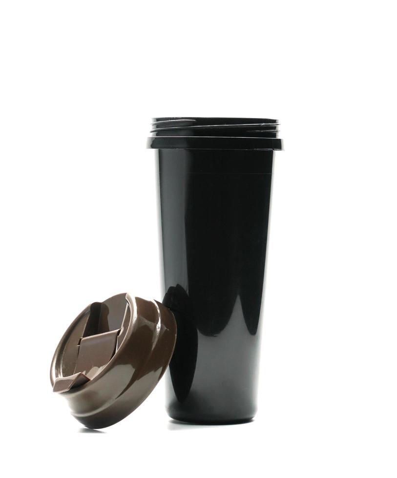 Thermos bottle isolated on white background. Coffee or tea reusable bottle container. Thermos travel tumbler. Insulated drink container. Black plastic thermos water flask. Zero waste. photo