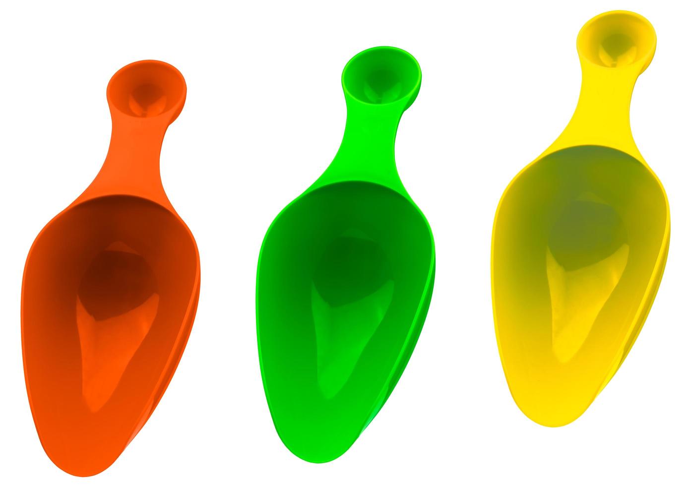 Set of colorful plastic measuring spoon isolated on white background with shadow. Orange, green, and yellow plastic measuring spoon. photo