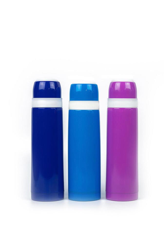 Thermos bottle isolated on white background. Coffee or tea reusable bottle container. Thermos travel tumbler. Insulated drink container. Stainless steel sport thermos water flask. Zero waste. photo