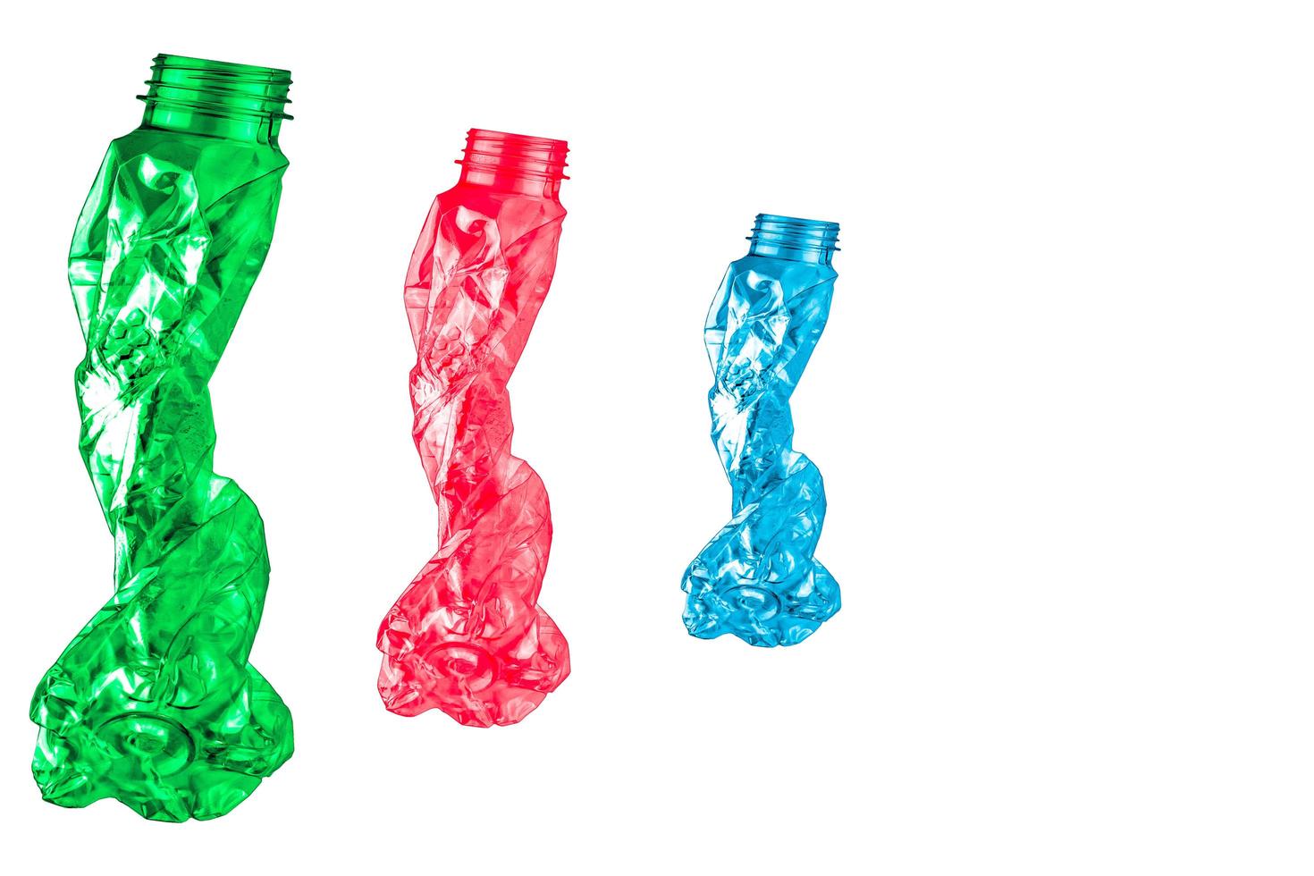 Set of colorful twisted empty plastic bottle isolated on white background. Plastic waste for recycle industry. photo