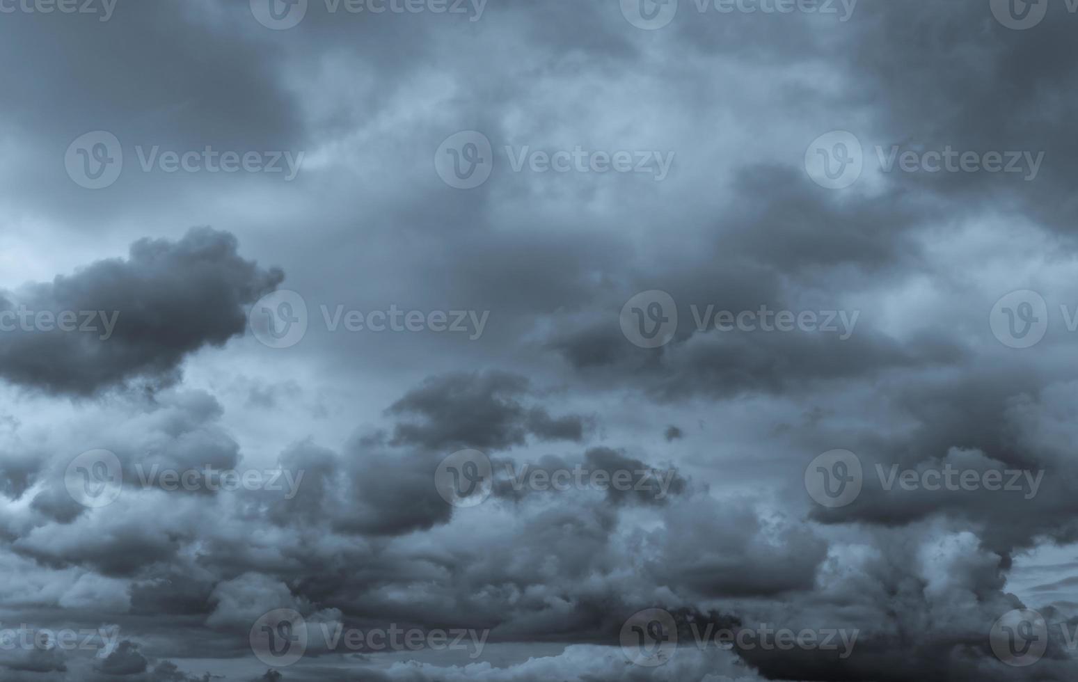 Dark dramatic sky and clouds. Background for death and sad concept. Gray sky and fluffy white clouds. Thunder and storm sky. Sad and moody sky. Nature background. Dead abstract background. Cloudscape. photo