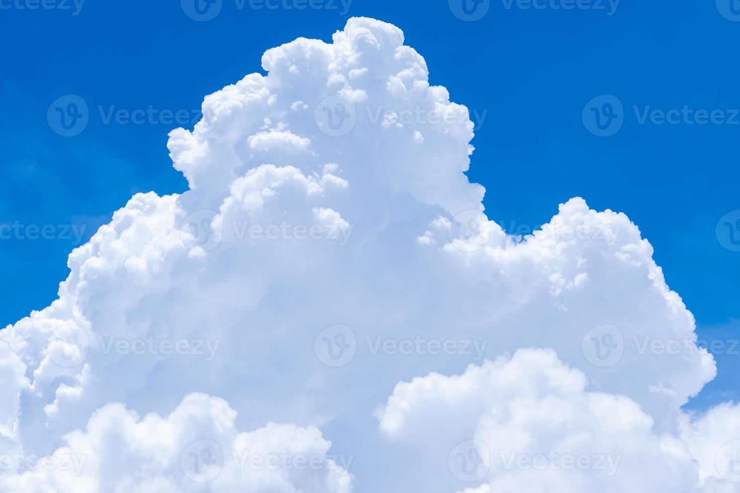 White fluffy clouds on blue sky. Soft touch feeling like cotton. White puffy cloudscape. Beauty in nature. Close-up white cumulus clouds texture background. Sky on sunny day. Pure white clouds. photo