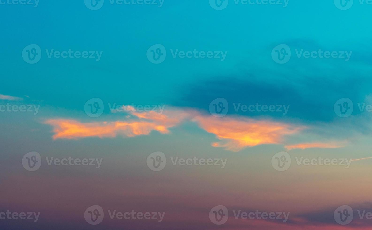Dramatic blue and purple sky and clouds abstract background. Blue-purple clouds on sunset sky. Warm weather background. Art picture of sky at dusk. Beautiful sunset sky. Fantasizing background. photo