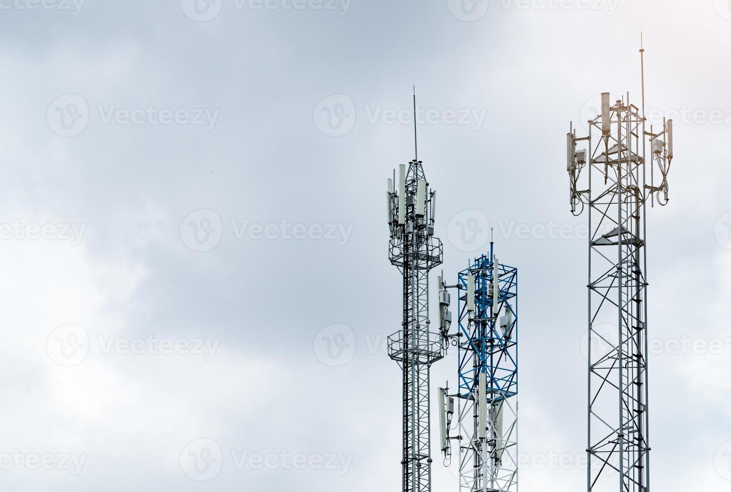 Telecommunication tower with gray sky. Antenna. Radio and satellite pole. Communication technology. Telecommunication industry. Mobile or telecom 4g network. Telecommunication industry. photo