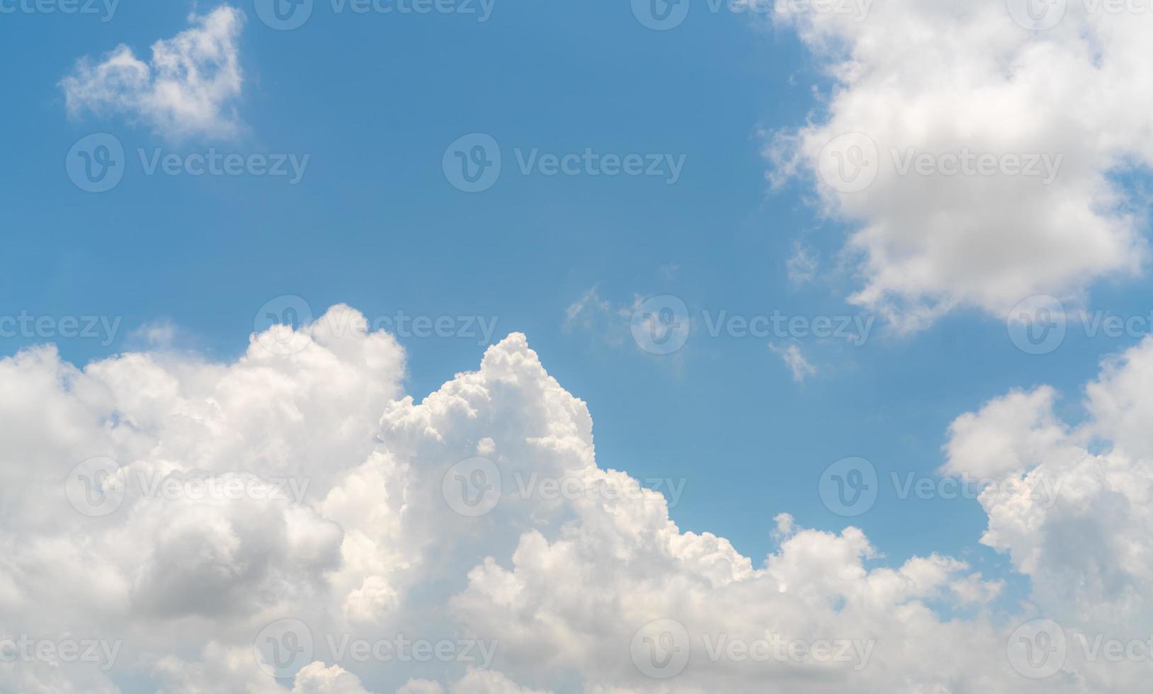 White fluffy clouds on blue sky. Soft touch feeling like cotton. White puffy cloudscape. Beauty in nature. Close-up white cumulus clouds texture background. Sky on sunny day. Pure white clouds. photo