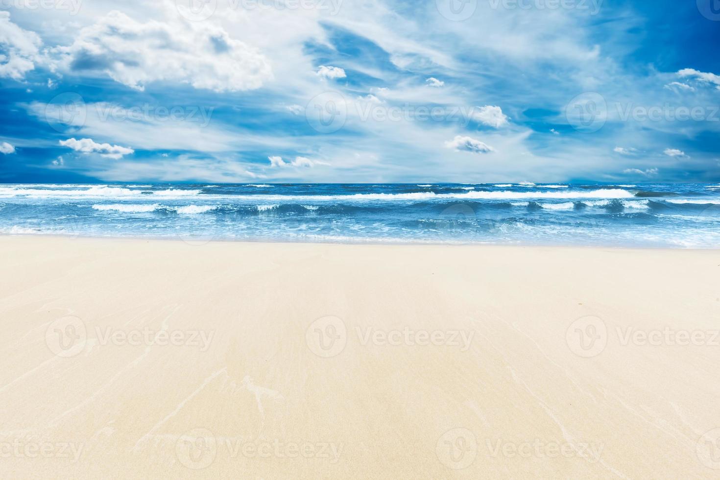 Summer beach and sea under sunny blue sky. photo