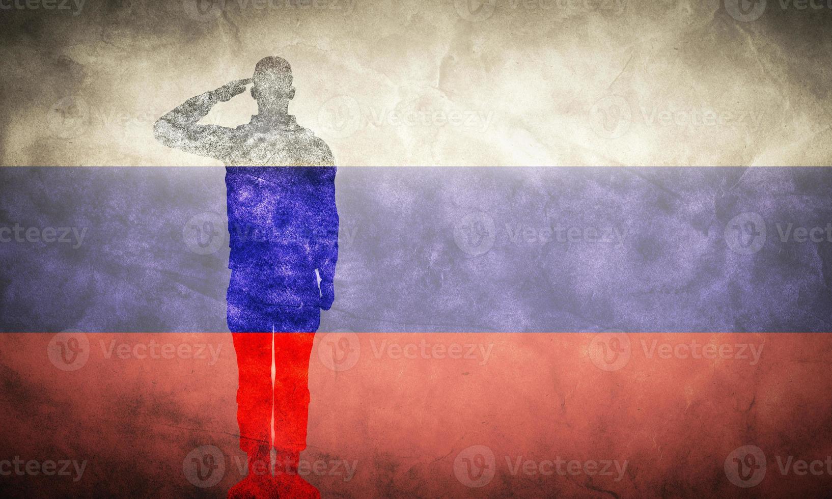 Russian grunge flag with soldier silhouette. photo