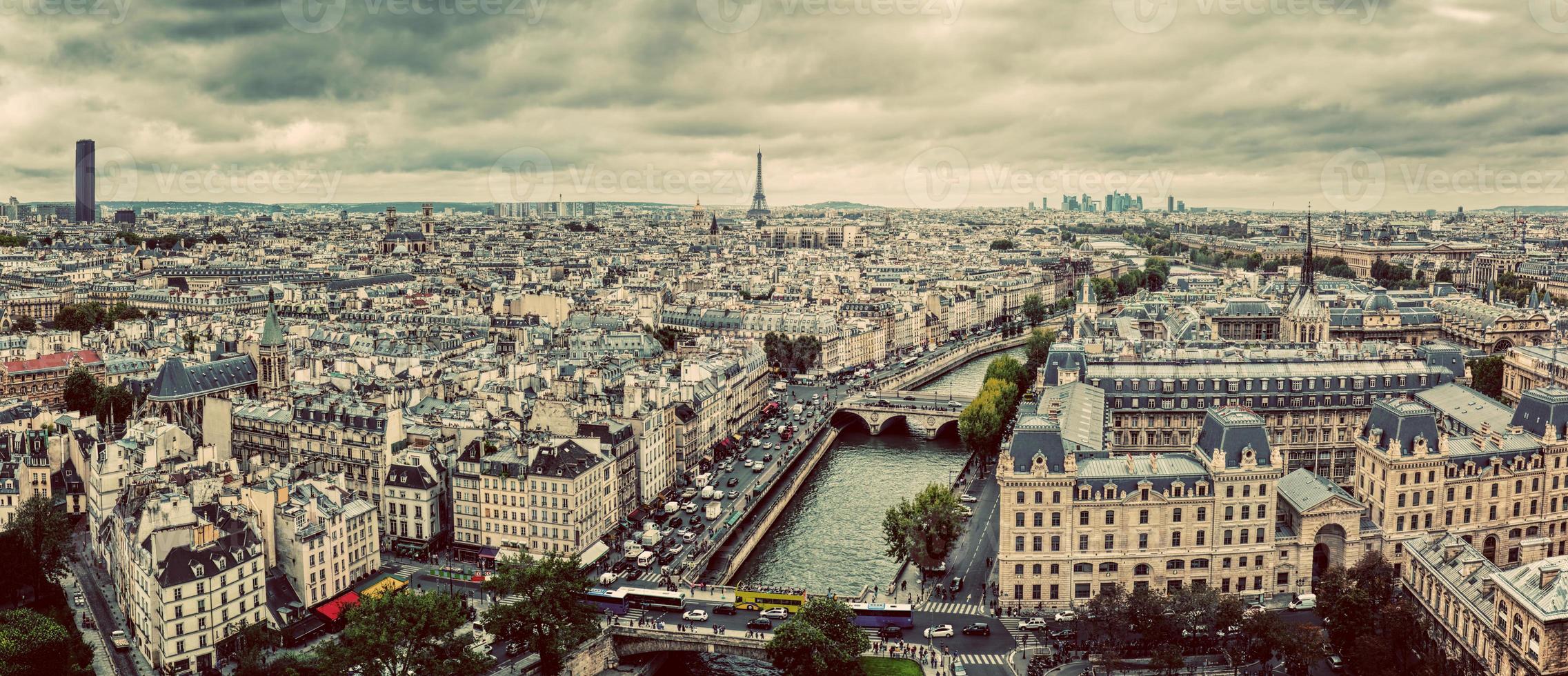 Paris, France panorama with Eiffel Tower, Seine river and bridges. Vintage photo