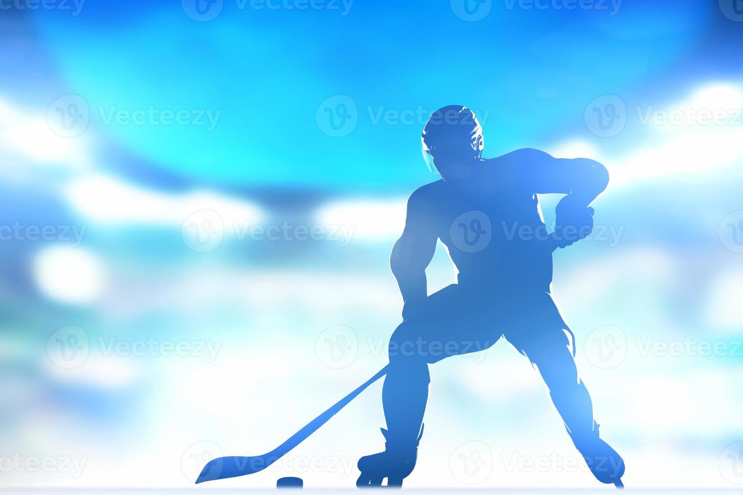 Hockey player skating with a puck in arena lighs photo