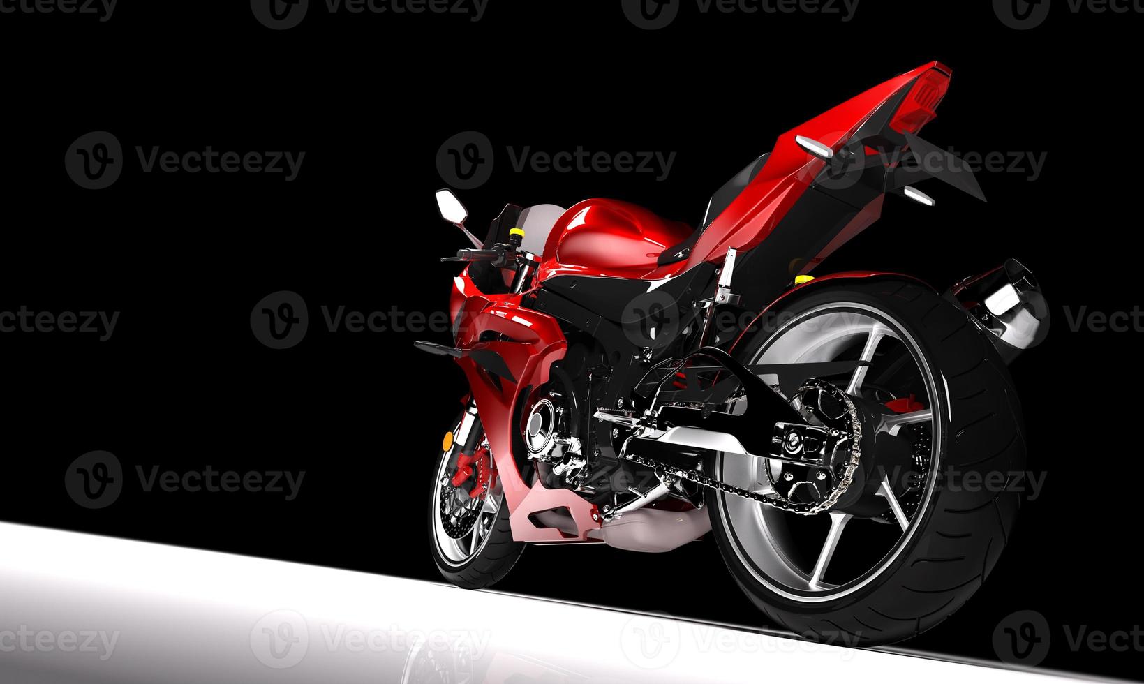 Side view of red sports motorcycle in a spotlight photo