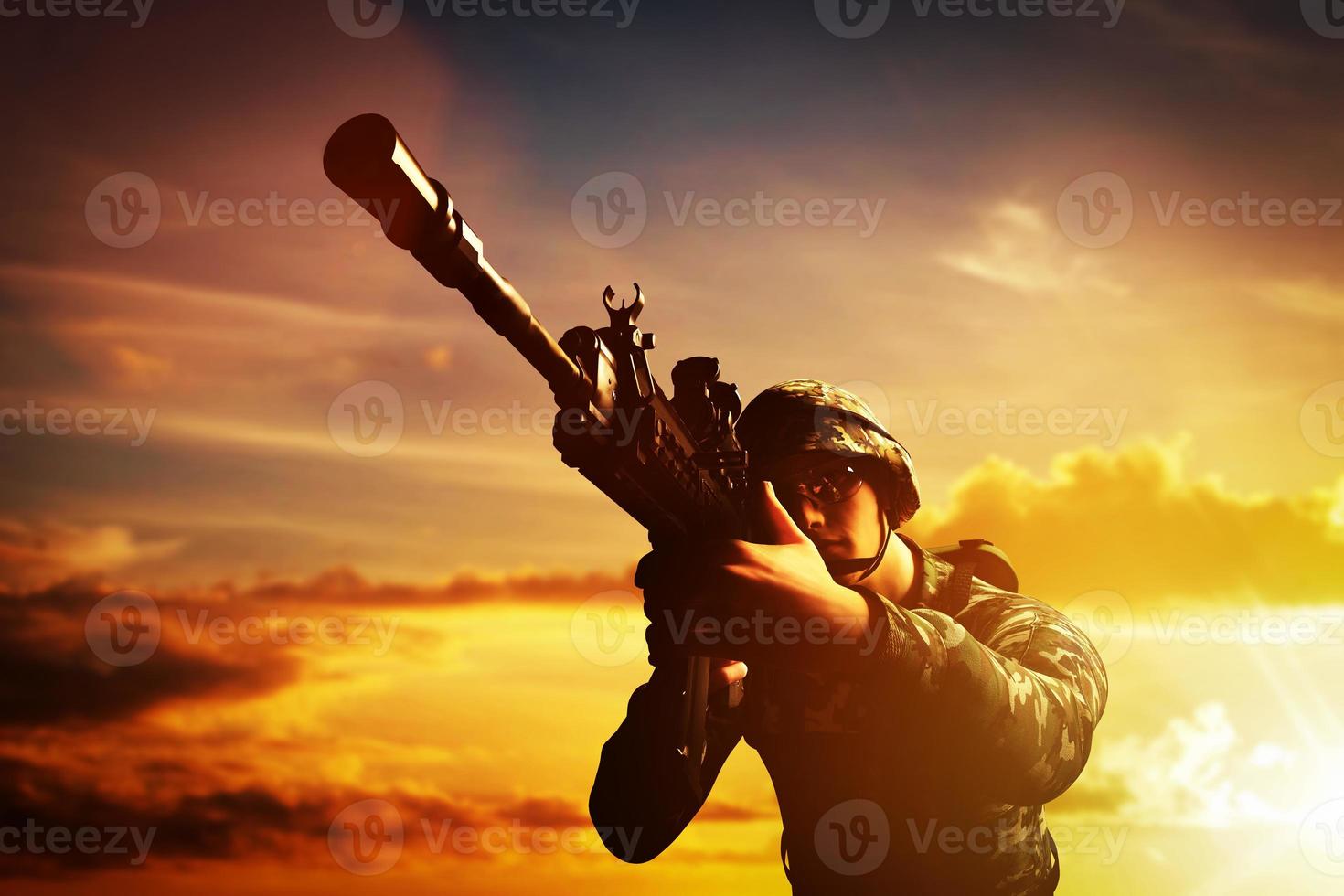 Soldier in combat shooting with his weapon, rifle. War, army concept photo