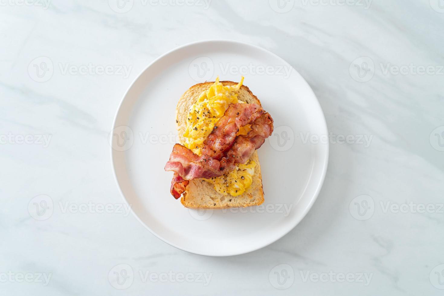 bread toast with scramble egg and bacon photo