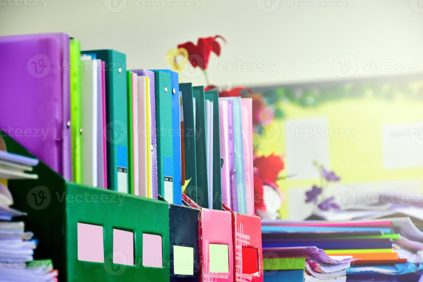 Closeup view of paperwork box for keeping various documents inside which is placed on the table in the office, soft focus. photo