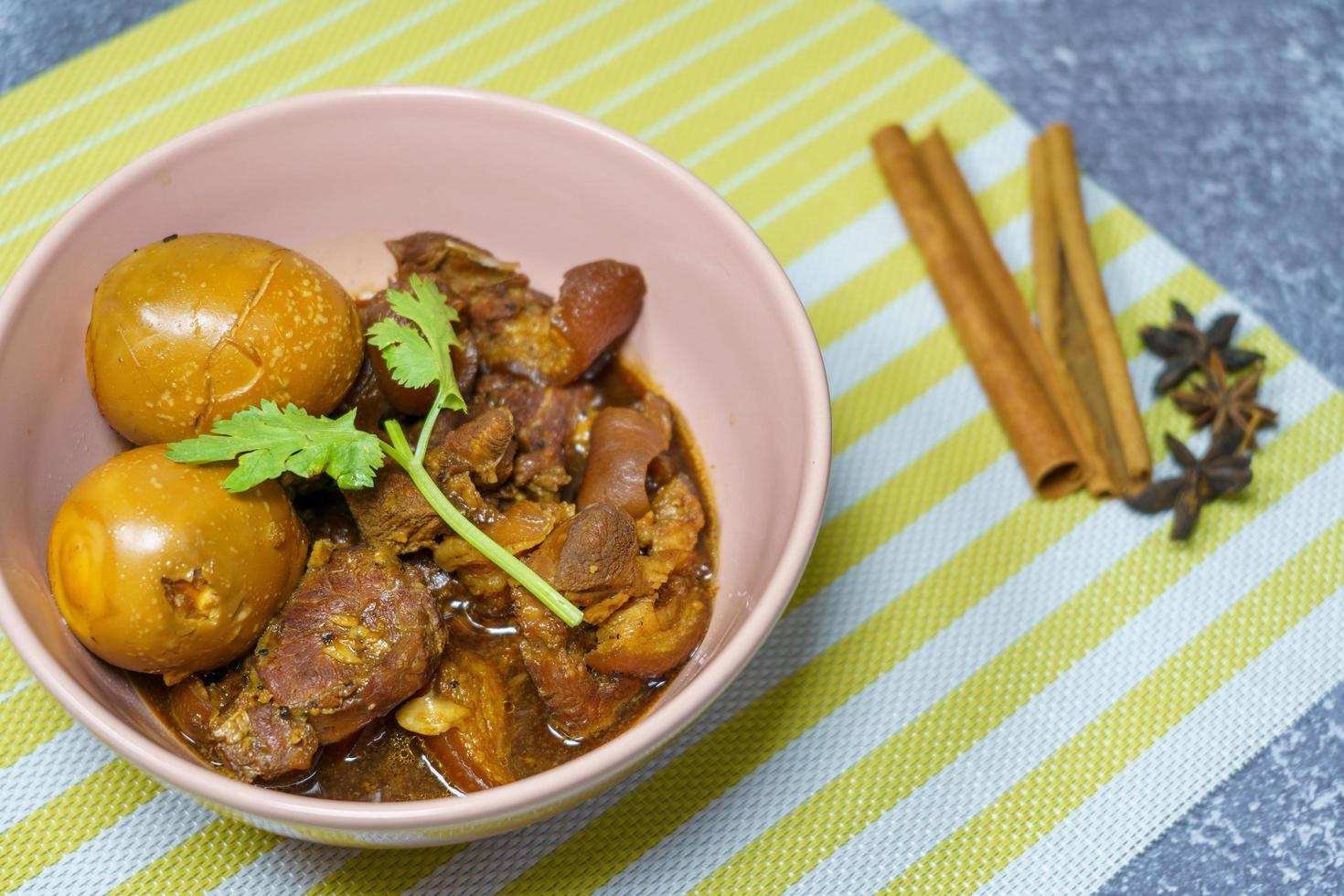 pork stewed in the gravy, name for chinese food Cook the meat with spices such cinnamon, coriander, star anise, and other sweet and salty ingredients. Set the fire to simmer until it's in place. photo