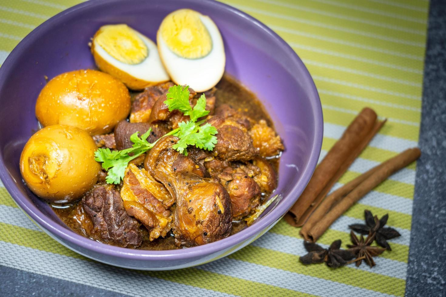 pork stewed in the gravy, name for chinese food Cook the meat with spices such cinnamon, coriander, star anise, and other sweet and salty ingredients. Set the fire to simmer until it's in place. photo