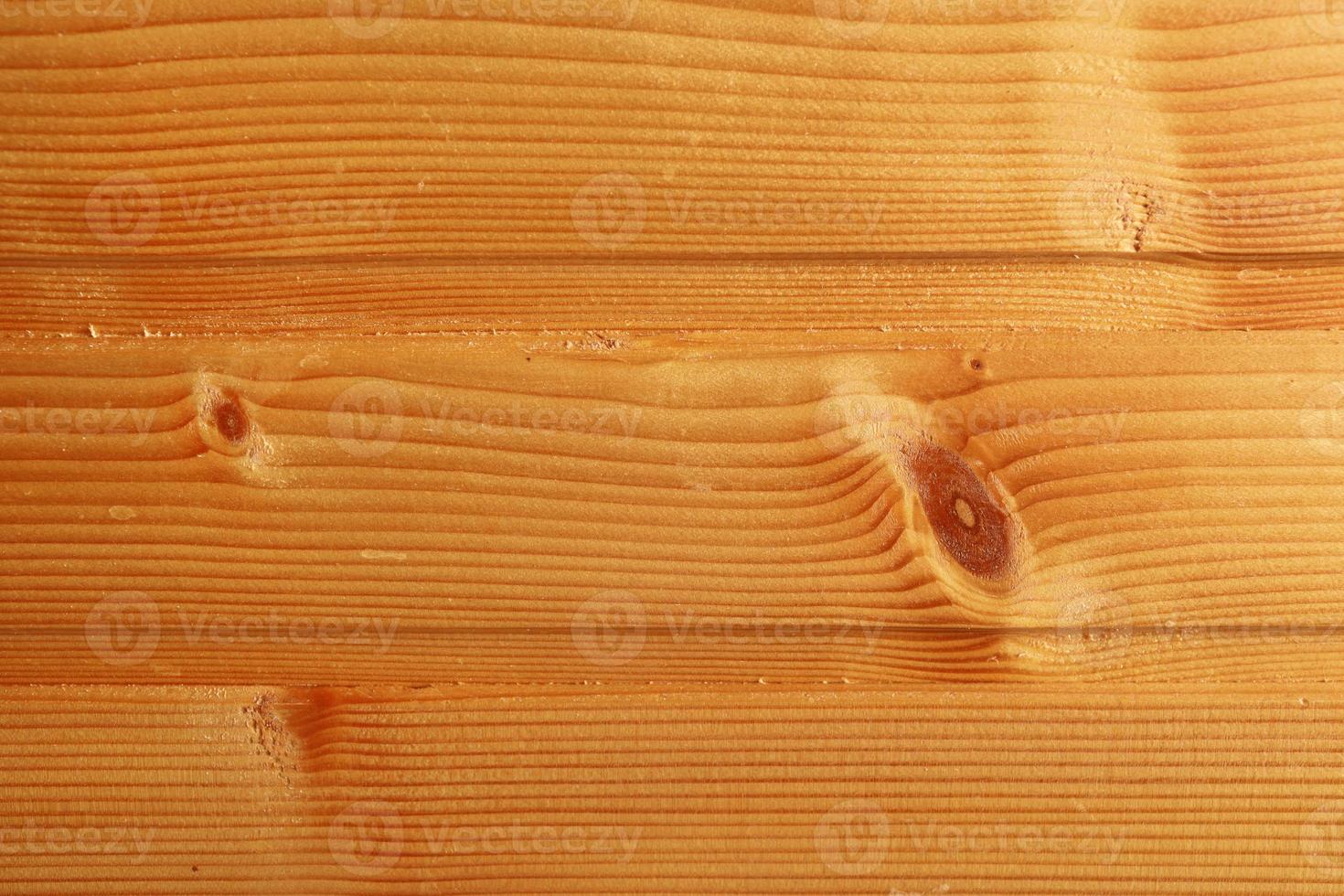 fondo horizontal de tablones lacados de madera marrón claro. tablones de madera de roble para paredes o suelos de parquet foto