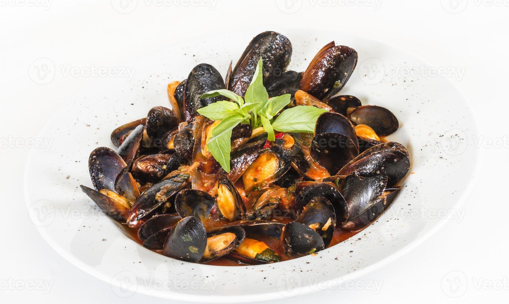 close up on mussels on white background photo