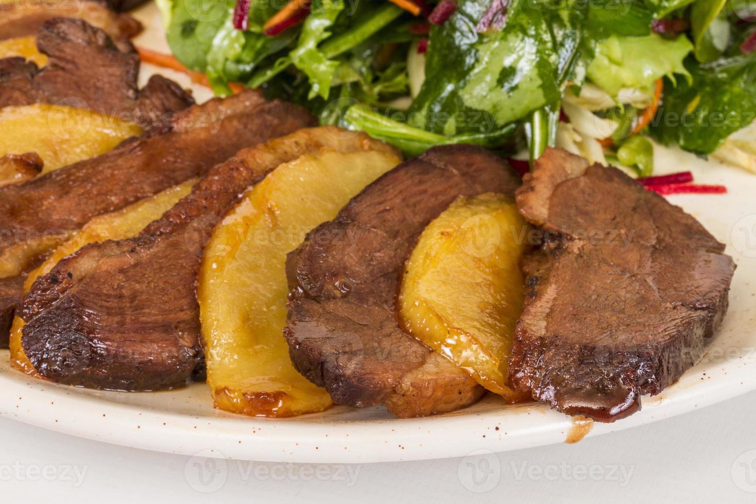 duck fillet, mashed potatoes seasoned with truffle oil, fig and aniseed sauce photo