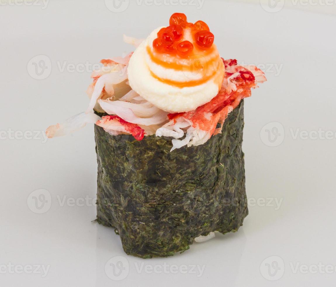 sushi kani with sauced slices of crab shrimp isolated on white background photo