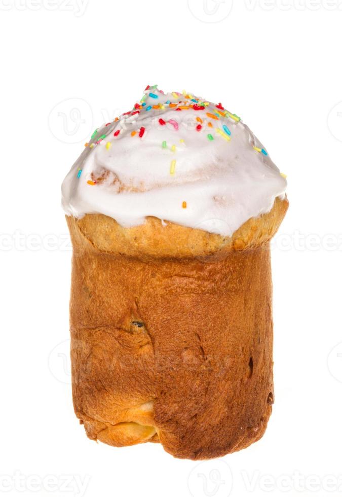 Easter cake with glace icing and easter eggs on white background photo