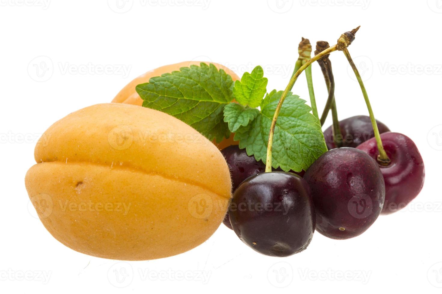 Ripe cherry and apricot photo