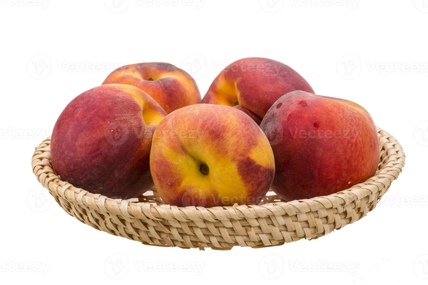 Bright ripe peaches photo