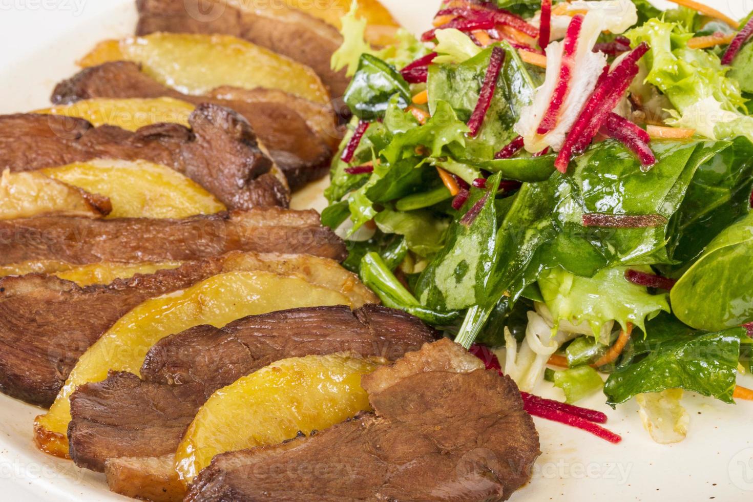 duck fillet, mashed potatoes seasoned with truffle oil, fig and aniseed sauce photo