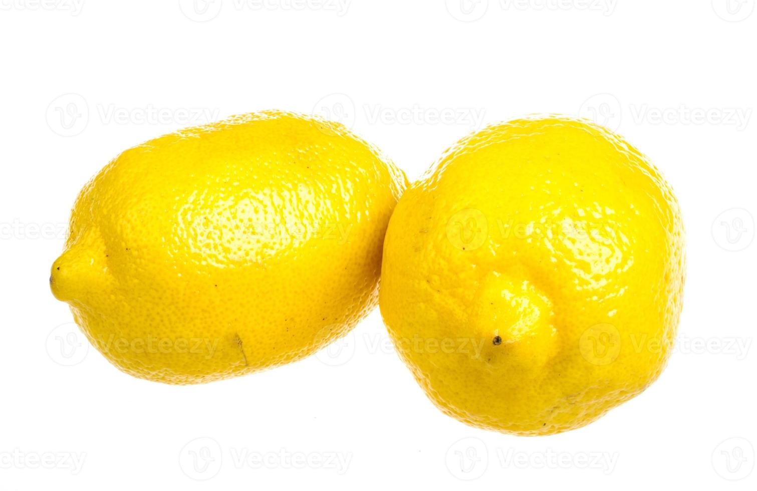 Fresh ripe lemons. Isolated on white background photo