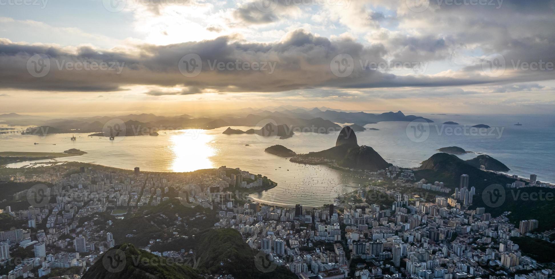 Sugarloaf mountain in Rio de Janeiro, Brazil. Botafogo buildings. Guanabara bay and Boats and ships. photo