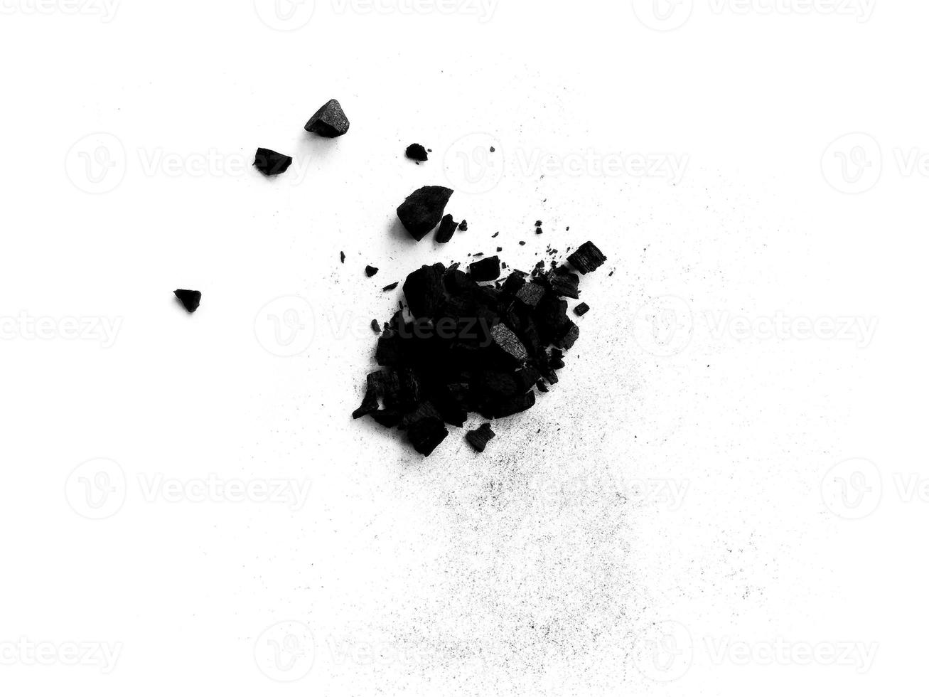 wood charcoal or Coal dust. Black charcoal texture. Black wood charcoal dust isolated on white background photo