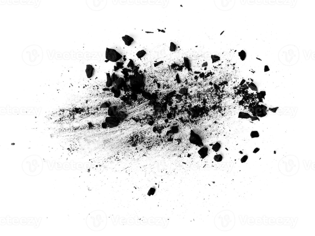 wood charcoal or Coal dust. Black charcoal texture. Black wood charcoal dust isolated on white background photo