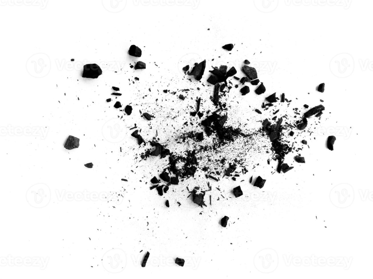 wood charcoal or Coal dust. Black charcoal texture. Black wood charcoal dust isolated on white background photo