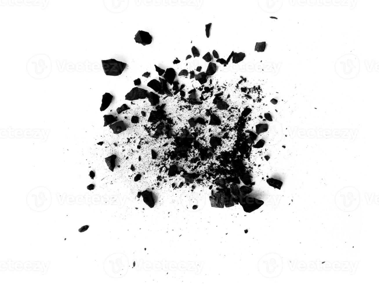 wood charcoal or Coal dust. Black charcoal texture. Black wood charcoal dust isolated on white background photo