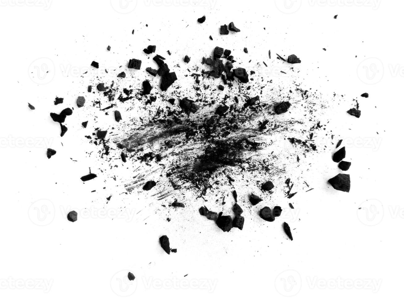 wood charcoal or Coal dust. Black charcoal texture. Black wood charcoal dust isolated on white background photo
